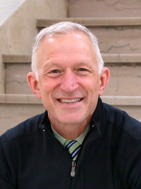 File:Mayor Roger Reinert on stairway in Duluth's City Hall (cropped).jpg