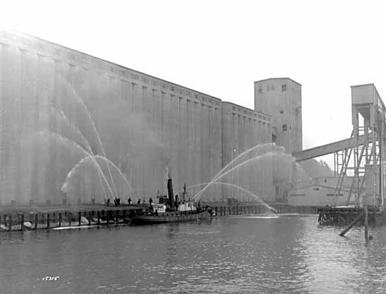 File:Fireboat Orion Battling a fire at a Vancouver grain elevator -c.jpg