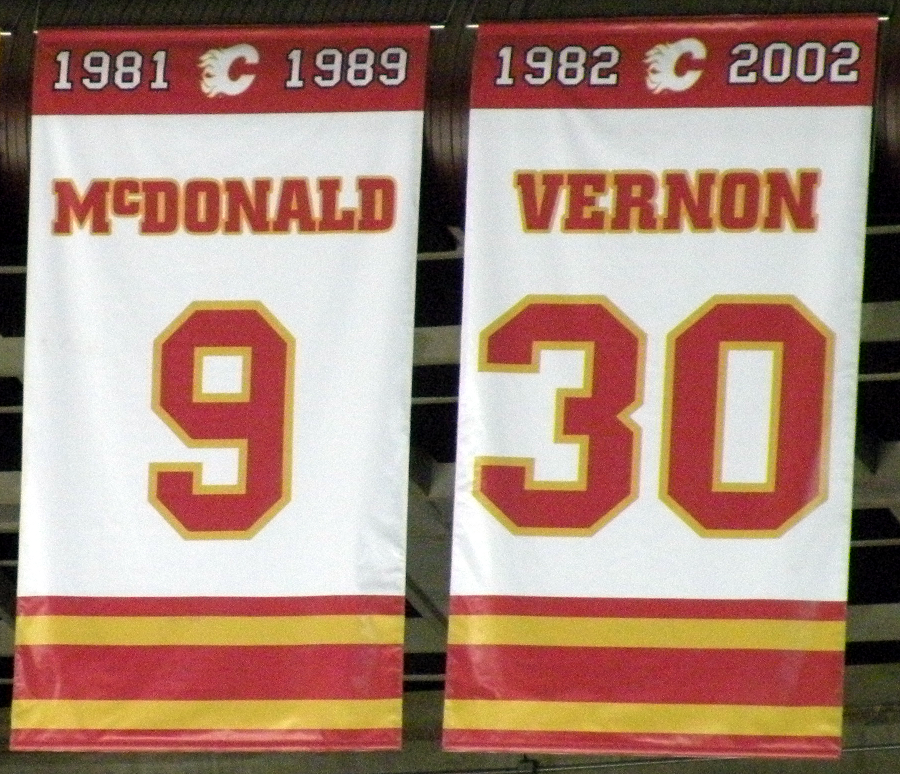 File:Flames retired banners 2011.png