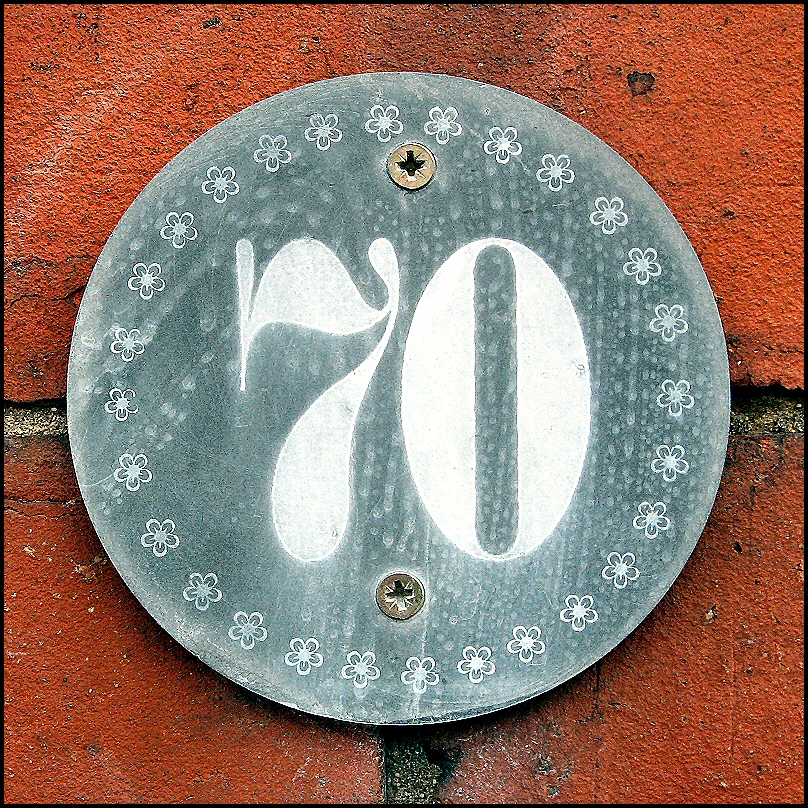 File:Decorative "70" house number plaque (Lincoln, England).jpg