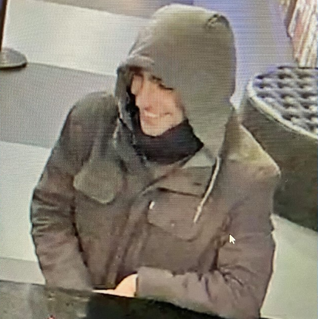 File:Suspect in Brian Thompson killing at hotel 01.png