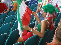 Football fan holding the Islamic Republic flag