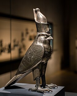 Ancient Egyptian figurine of Horus as falcon god with an Egyptian crown; c. 500 BC; silver and electrum; height: 26.9 cm; Staatliche Sammlung für Ägyptische Kunst (Munich, Germany)