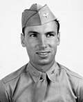 Man with air force uniform looking to the side.