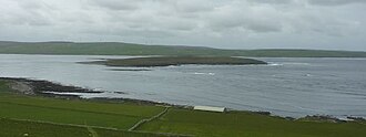 Eynhallow viewed from Rousay, from the north-east, with the Orkney Mainland beyond