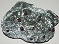 Garnet porphyroblasts in schist featuring the deflection of the foliation around their space