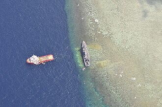 The USS Guardian aground as seen from above