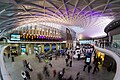 Image 7London King's Cross railway stationPhoto: ColinThe western departures concourse of London King's Cross railway station as seen through a fisheye lens. This semi-circular concourse, designed by John McAslan, built by Vinci, and completed in March 2012, is designed to cater to much-increased passenger flows, and provide greater integration between the intercity, suburban and Underground sections of the station.More featured pictures