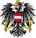 The previous design, without the broken chains symbolizing the end of fascism, was used 1919–1934