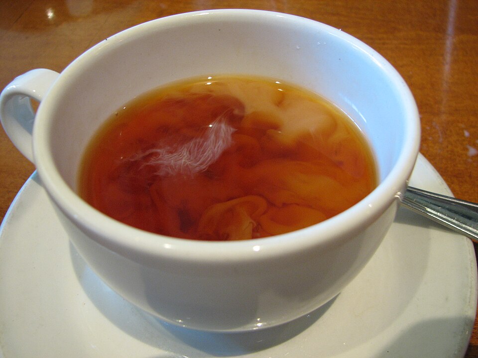 File:Milk clouds in tea.jpeg