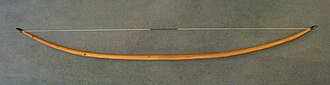 English longbow made of yew. It is 6 feet 6 inches (1.98 m) long with a draw force of 110 pounds-force (470 N).