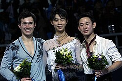 Patrick Chan, Yuzuru Hanyu, and Denis Ten pose together