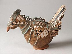 Image of a fantasy bird decorated with white-yellow color fields and a garland over the back (1960)