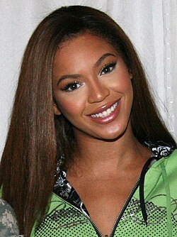 Beyoncé  smiling.