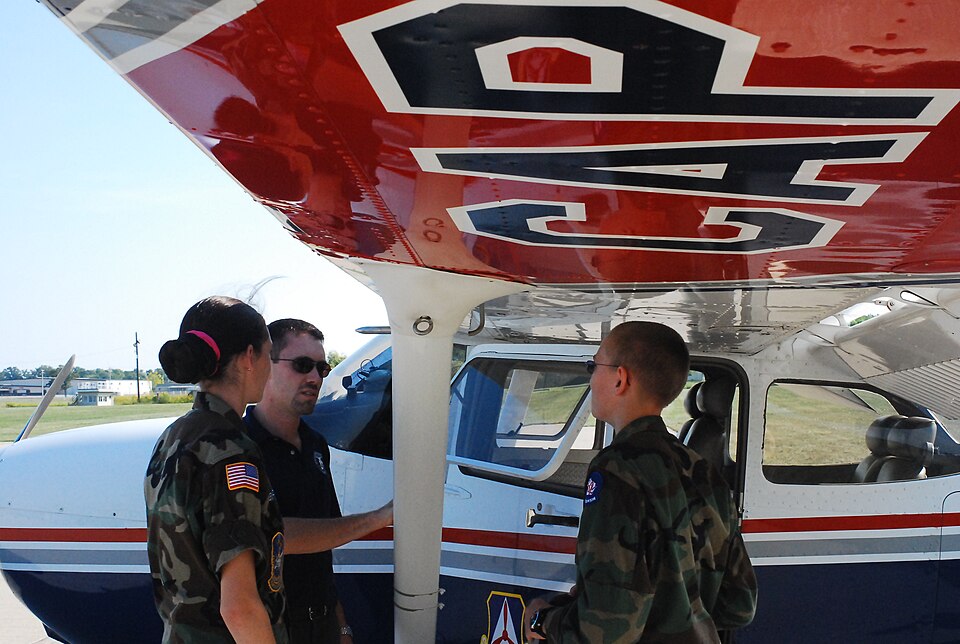 File:CAP cadets standing under wing.jpg