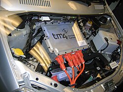 A demonstration car with an electric engine is shown as an exhibit.