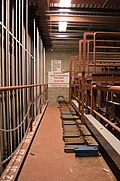 Loading bridge. Weights are seen on floor.