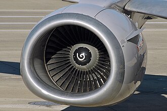 737 Classic with larger CFM56 engine mounted mostly ahead of the wing with an ovoid "hamster pouch" inlet with a flattened bottom
