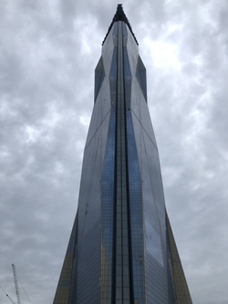 The glass elevator shaft in the middle