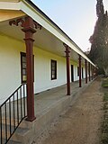The adobe's south face