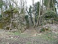 Passageway out of castle with the remains of large masonry towers on each side