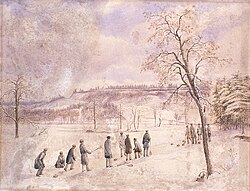 group of people on the ice of a pond
