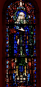 St. Brigid holds a church and an oak leaf.