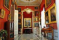 The interior of the palace featuring a gallery of paintings