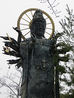 Statue of the eighteen-armed Juntei Kannon at Shichihō-ji in Nose, Osaka, Japan.