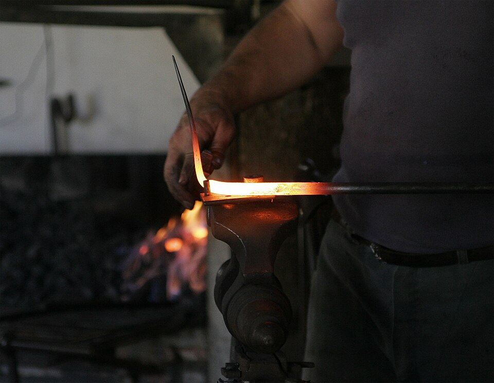File:Blacksmith at work.jpg