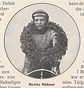 A man with a wreath around his neck