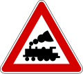 I-37Level crossing without barriers ahead.