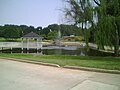 Duck pond with gazebo at apartment in Covington, Georgia, US