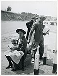 Original caption: "Negro Family waiting for ride into town", Halifax County, Virginia, March 1941.