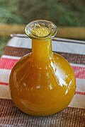 Image 26A berele glass containing tej, a honey wine brewed and consumed in Ethiopia. (from List of national drinks)