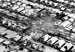 The site of a plane crash in surburban Chicago, with several homes destroyed