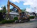 August 19thCrawler-backhoe  with a narrow sheepsfoot roller
