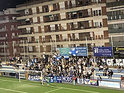 CE Europa's supporter group Eskapulats in a match in 2023-24.