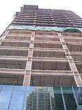 View of the steel structure with curtainwall glass installed.
