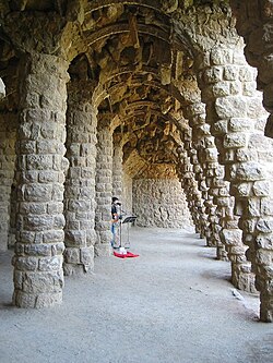 Colonnaded footpath under a viaduct