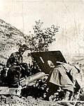 Italian soldiers using Škoda M.16 howitzer in the Balkans, 1941.