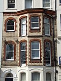 White and terracotta coloured mathematical tiles on Grand Parade