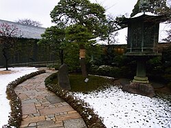 Green under snow at Nezu Museum