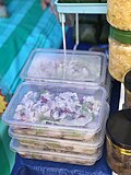 Hinava served inside a container during a food festive