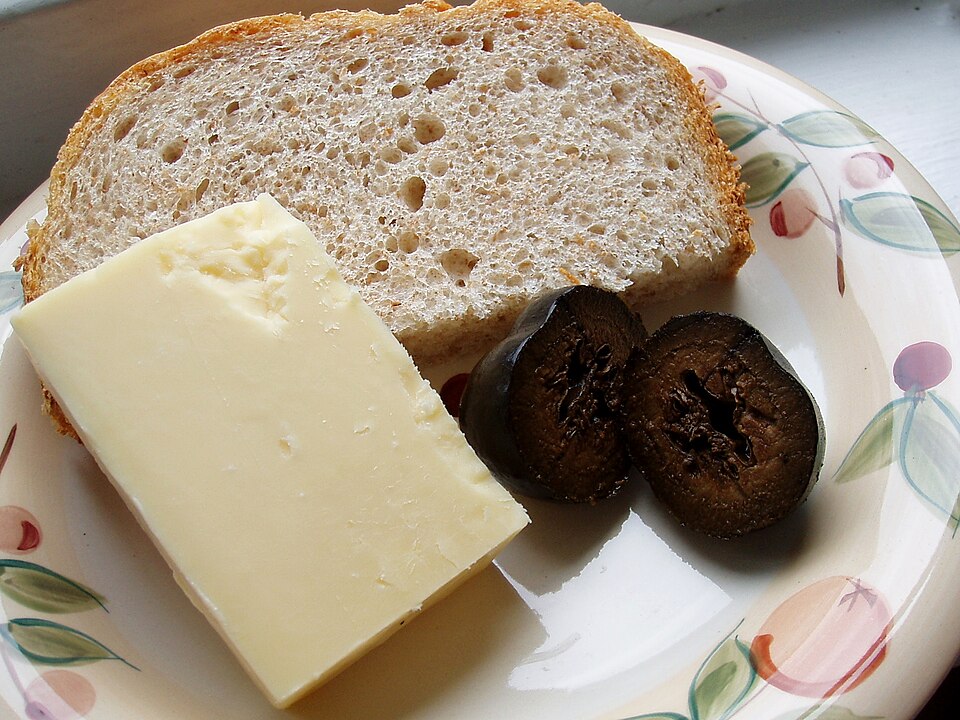 File:Pickled walnuts with cheese and bread.jpg