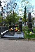 The tombstones of Stanislav Lukiyanchenko (center) and writer Lazar Karmen (right)