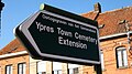 Sign pointing to the extension