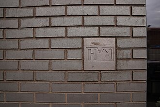 Assay Office Birmingham hallmark on wall - HM