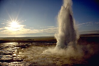 Eruption of Strokkur close by.