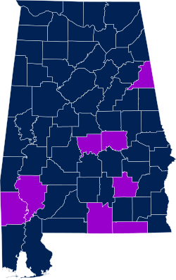 Map of Alabama divided by county with Autauga, Clarke, Cleburne, Covington, Elmore, Geneva, Pike, and Washington Counties highlighted.